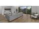 Comfortable living room with hardwood floors, stylish seating, and sliding glass doors providing access to outdoor mountain views at 14828 E Valley Vista Dr, Fountain Hills, AZ 85268