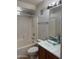 Bathroom with tub/shower, decorative bowl sink, and mirrored medicine cabinets at 280 S Evergreen Rd # 1301, Tempe, AZ 85288