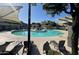 Community pool with surrounding lounge chairs and shade structures at 280 S Evergreen Rd # 1301, Tempe, AZ 85288
