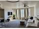 Spacious living area with large windows and comfortable seating at 280 S Evergreen Rd # 1301, Tempe, AZ 85288