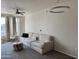 Bright living room with large windows and comfortable seating at 280 S Evergreen Rd # 1301, Tempe, AZ 85288