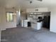 Open-concept living space combining the living room and kitchen areas for a connected feel at 280 S Evergreen Rd # 1301, Tempe, AZ 85288