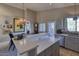 Bright kitchen with an island and view to backyard at 3212 E Desert Cove Ave, Phoenix, AZ 85028