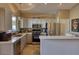 Updated kitchen featuring stainless steel appliances and a breakfast bar at 3212 E Desert Cove Ave, Phoenix, AZ 85028