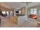 Spacious living room with vaulted ceilings, fireplace, and ample natural light at 3212 E Desert Cove Ave, Phoenix, AZ 85028