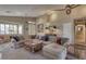 Relaxing living room with sectional sofa and plenty of seating at 3212 E Desert Cove Ave, Phoenix, AZ 85028