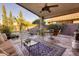 Relaxing patio with seating area and pool view at 3212 E Desert Cove Ave, Phoenix, AZ 85028