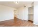 Spacious bedroom featuring wood-look floors and a mirrored closet at 3555 S Payton St, Mesa, AZ 85212
