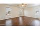 Spacious bedroom with wood floors and multiple windows at 3555 S Payton St, Mesa, AZ 85212