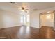 Main bedroom with wood flooring and access to bathroom at 3555 S Payton St, Mesa, AZ 85212