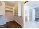 Large walk-in closet with shelving and hanging rods at 3555 S Payton St, Mesa, AZ 85212