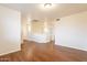 Upstairs hallway with wood-look floors and neutral walls at 3555 S Payton St, Mesa, AZ 85212