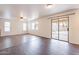 Living room with sliding doors that open to the backyard pool at 3555 S Payton St, Mesa, AZ 85212