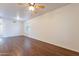 Bright living room with hardwood floors and ceiling fan at 3555 S Payton St, Mesa, AZ 85212