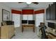 Home office with built-in cabinets and large window at 6031 S Agate Pl, Chandler, AZ 85249