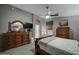 Main bedroom with dresser and large bed at 6031 S Agate Pl, Chandler, AZ 85249