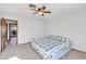 Bedroom with ceiling fan and access to another room at 6431 W Sierra St, Glendale, AZ 85304