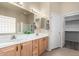 Bathroom with double sinks, a soaking tub and a separate shower at 8141 E Apache Plumb Dr, Gold Canyon, AZ 85118