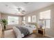 Virtually staged main bedroom with wood flooring at 8141 E Apache Plumb Dr, Gold Canyon, AZ 85118