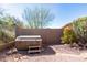 Hot tub with wooden steps in backyard at 8141 E Apache Plumb Dr, Gold Canyon, AZ 85118