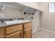Laundry room with sink,cabinets and shelving at 8141 E Apache Plumb Dr, Gold Canyon, AZ 85118