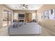 Living room with fireplace, comfortable seating, and access to backyard at 8141 E Apache Plumb Dr, Gold Canyon, AZ 85118