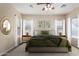 Spacious main bedroom with a large bed, wood flooring and plenty of natural light at 8141 E Apache Plumb Dr, Gold Canyon, AZ 85118