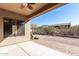 Covered patio with brick pavers and ceiling fan at 8141 E Apache Plumb Dr, Gold Canyon, AZ 85118
