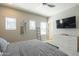 Main bedroom with large TV and plenty of closet space at 8184 N 22Nd Dr, Phoenix, AZ 85021
