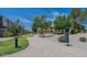 Walking path with mature trees and pet waste station at 8184 N 22Nd Dr, Phoenix, AZ 85021