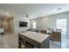 Open concept dining area with view into kitchen and living room at 8184 N 22Nd Dr, Phoenix, AZ 85021