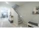 Staircase and entryway with storage and seating at 8184 N 22Nd Dr, Phoenix, AZ 85021