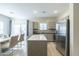 Modern kitchen with stainless steel appliances and island at 8184 N 22Nd Dr, Phoenix, AZ 85021
