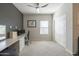 Home office with built-in desk and ceiling fan at 8184 N 22Nd Dr, Phoenix, AZ 85021