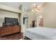 Bright main bedroom features a ceiling fan, walk-in closet, and en-suite bathroom at 905 E Knight Ln, Tempe, AZ 85284