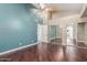 Large bedroom with a ceiling fan and mirrored closet doors at 905 E Knight Ln, Tempe, AZ 85284