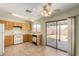 Bright kitchen featuring wood cabinets and tile flooring at 11242 W Diana Ave, Peoria, AZ 85345