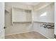 Large walk-in closet with ample shelving and hanging space at 13520 W Junipero Dr, Sun City West, AZ 85375