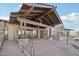 Desert Camp community center entrance with stone accents and covered entryway at 18650 N Thompson Peak Pkwy # 1070, Scottsdale, AZ 85255