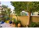 Private patio with lush landscaping and garden at 18650 N Thompson Peak Pkwy # 1070, Scottsdale, AZ 85255