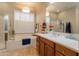 Elegant bathroom with soaking tub, double vanity, and walk-in shower at 2554 E Honeysuckle Pl, Chandler, AZ 85286