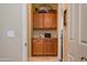 Well-organized hallway closet with double doors and ample shelving at 2554 E Honeysuckle Pl, Chandler, AZ 85286