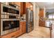 Modern kitchen with stainless steel appliances and granite countertops at 2554 E Honeysuckle Pl, Chandler, AZ 85286
