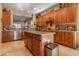 Island kitchen with stainless steel appliances and granite countertops at 2554 E Honeysuckle Pl, Chandler, AZ 85286
