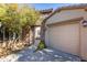 Landscaped side yard with a gated access to the backyard at 2554 E Honeysuckle Pl, Chandler, AZ 85286