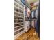 Large walk-in closet with ample shelving and hanging space at 2554 E Honeysuckle Pl, Chandler, AZ 85286