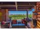 Outdoor seating with beautiful views of the golf course, desert landscape, and mountains at 41716 N Laurel Valley Way, Anthem, AZ 85086