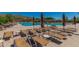 Enjoy the community pool with ample lounge seating and mountain views in this active adult community at 41716 N Laurel Valley Way, Anthem, AZ 85086