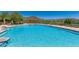Enjoy the community pool with views of the desert landscape, mountains, and nearby golf course at 41716 N Laurel Valley Way, Anthem, AZ 85086