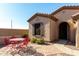 Red metal patio furniture on brick pavers next to the house at 5556 S Hawthorn St, Gilbert, AZ 85298